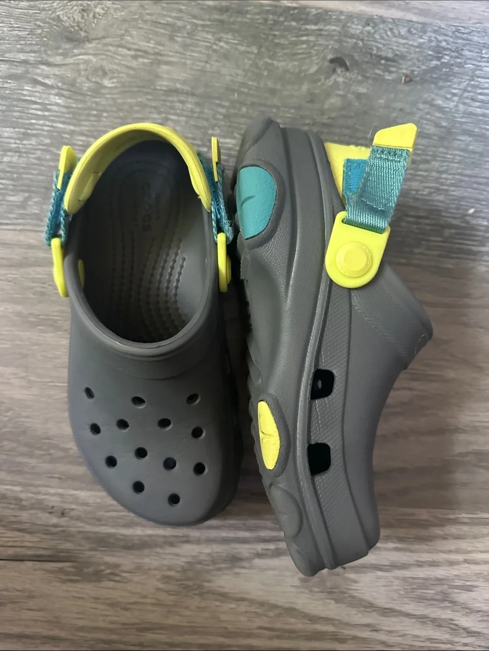 CROCS all terrain Clogs in Gray with Yellow Heel Strap kids size J1